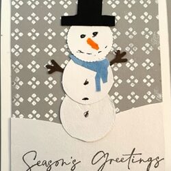 A Snowman Card Using a Mask and Heat Embossing